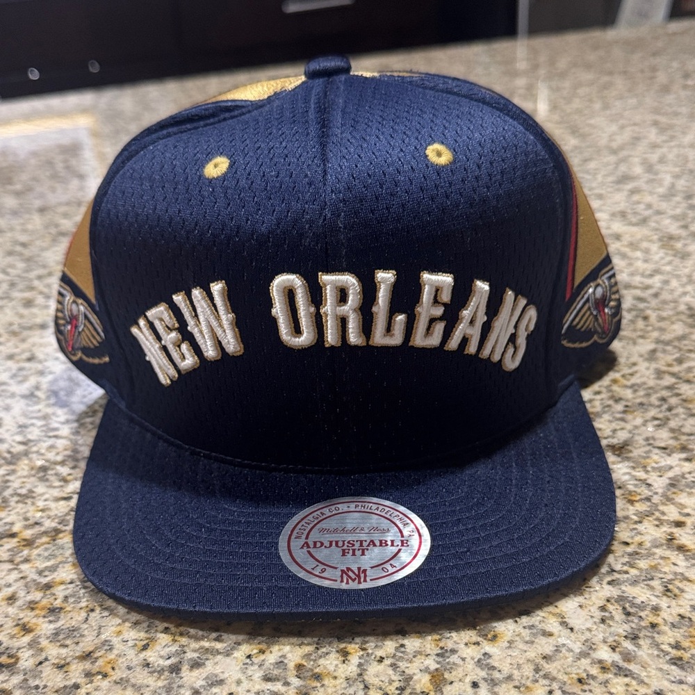 Mitchell & Ness Navy and Gold New Orleans SnapBack